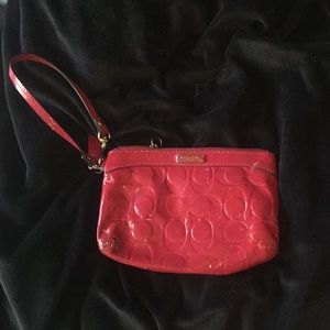 Red patent leather coach wristlet